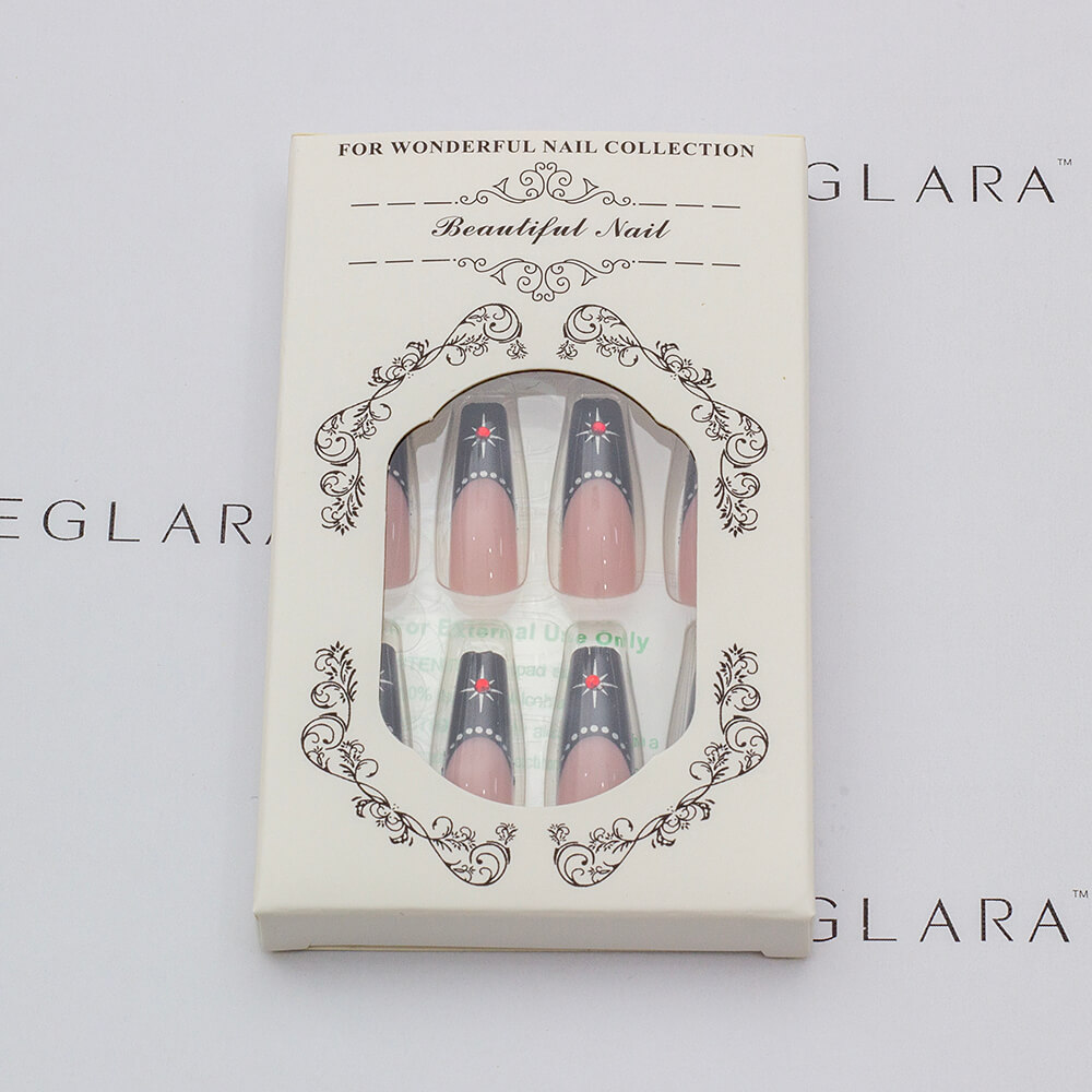 Box of press-on nails with black tips and star accents, shown through an elegant white package labeled 'Beautiful Nail' by Eleglara
