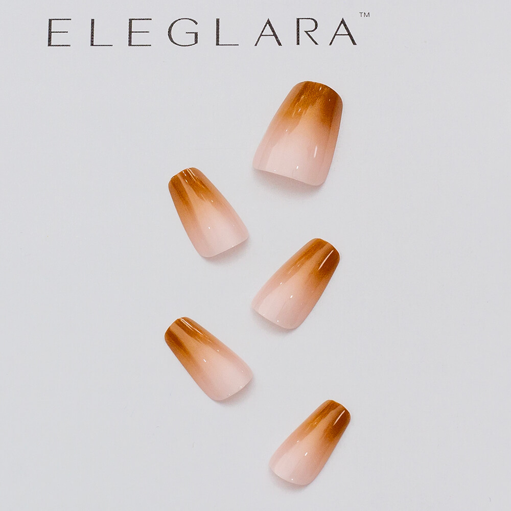 Five medium almond press-on nails with brown to pink gradient, glossy finish, arranged on a white background with the Eleglara logo, showcasing the warm, boho design.